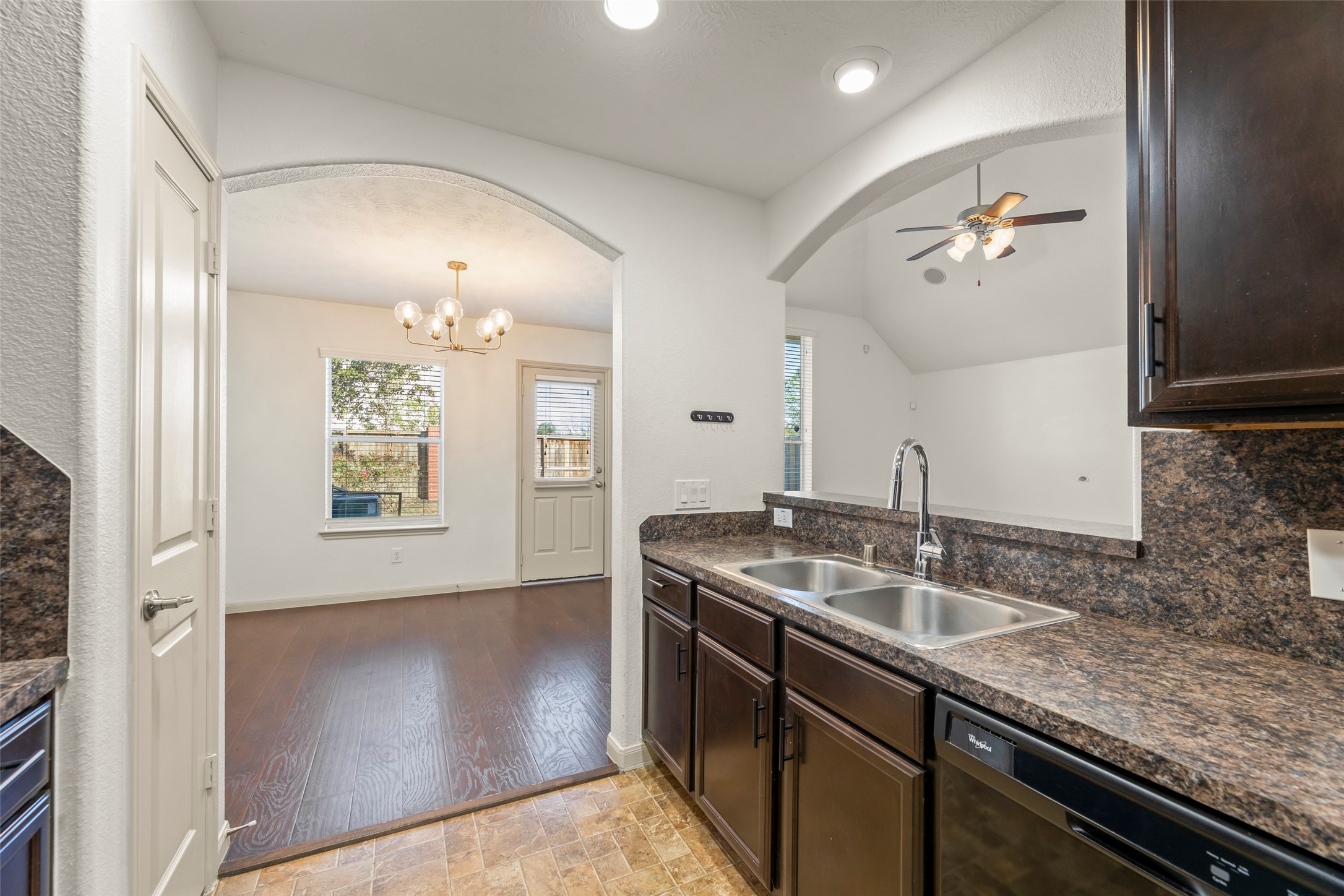 3406 Inverness Path Lane Houston, TX 77053 - Photo 4 of 34 a bathroom with a granite countertop sink a toilet a mirror and shower