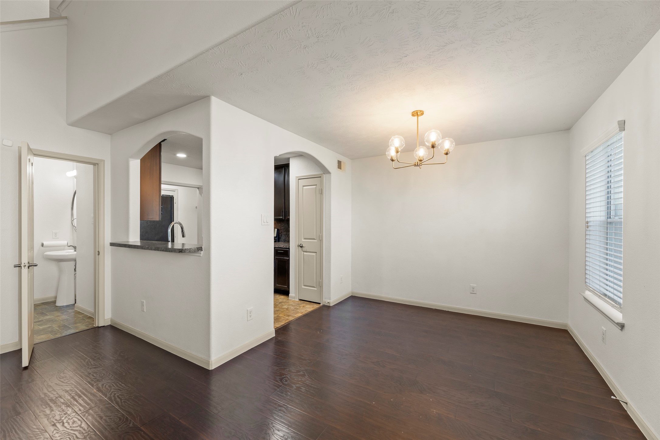 3406 Inverness Path Lane Houston, TX 77053 - Photo 8 of 34 wooden floor in an empty room with a window