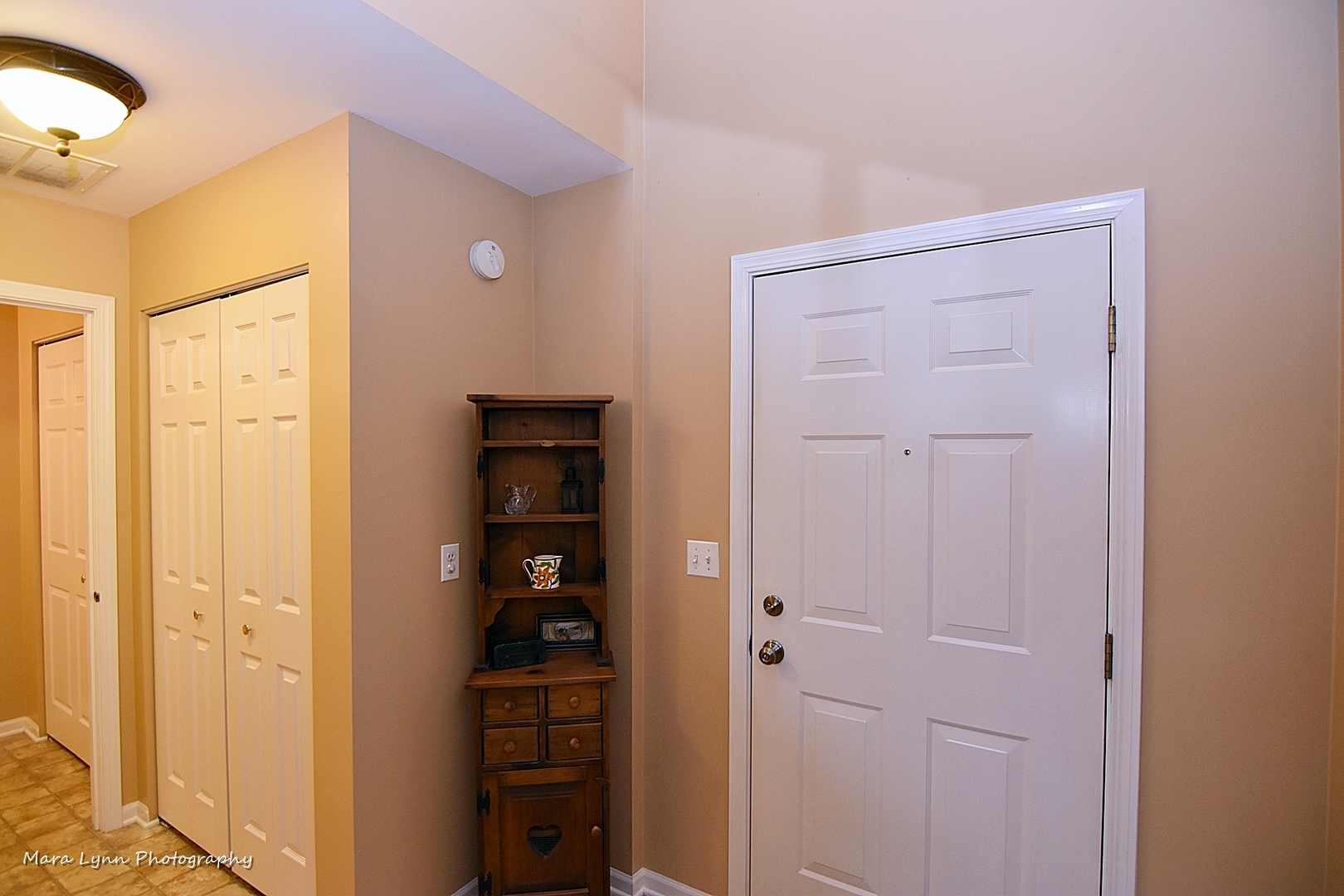 47 Rolling Oaks Road, Unit B Sugar Grove, IL 60554 - Photo 12 of 22 a view of a hallway with wooden floor and closet