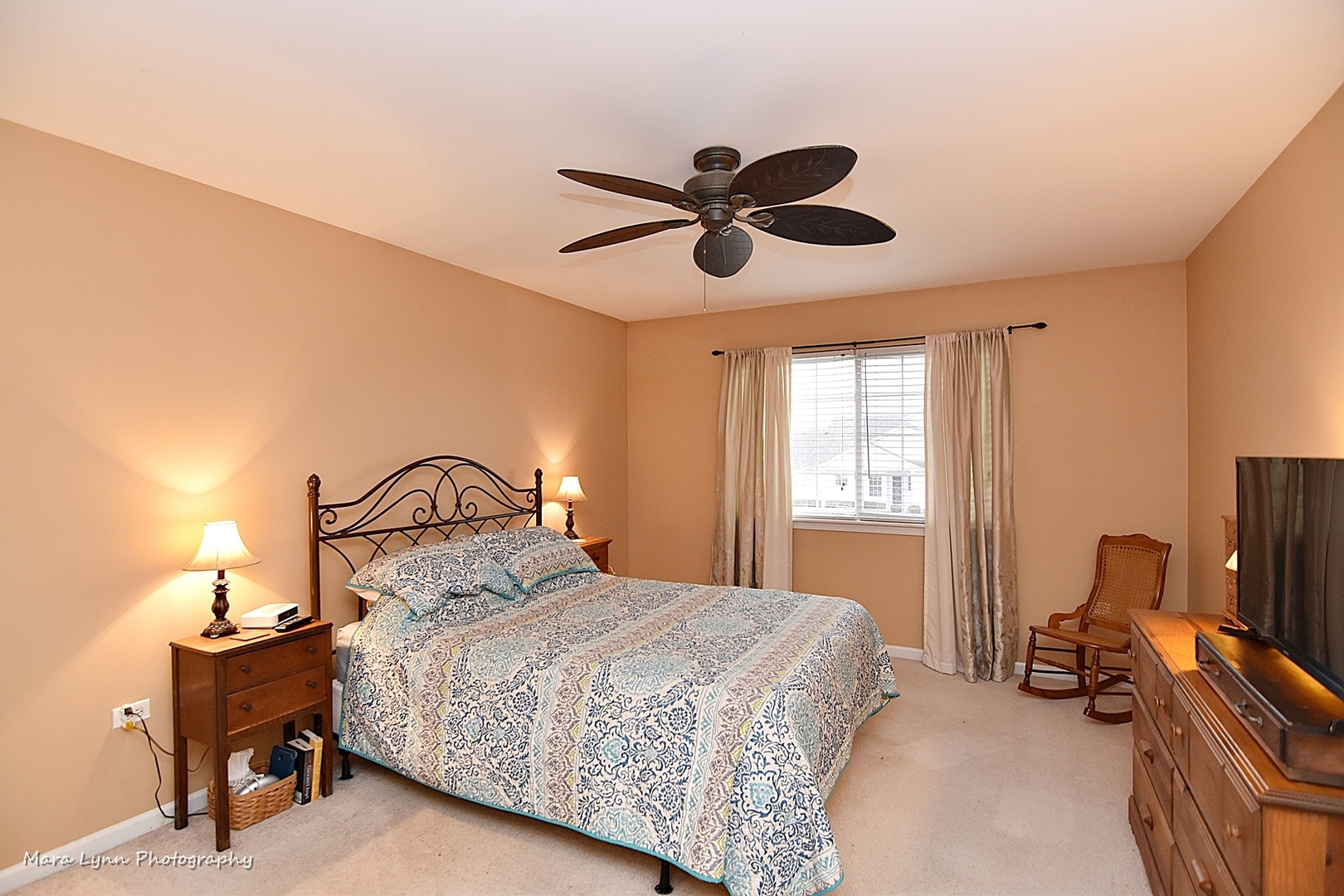 47 Rolling Oaks Road, Unit B Sugar Grove, IL 60554 - Photo 15 of 22 a bedroom with a bed and a chandelier