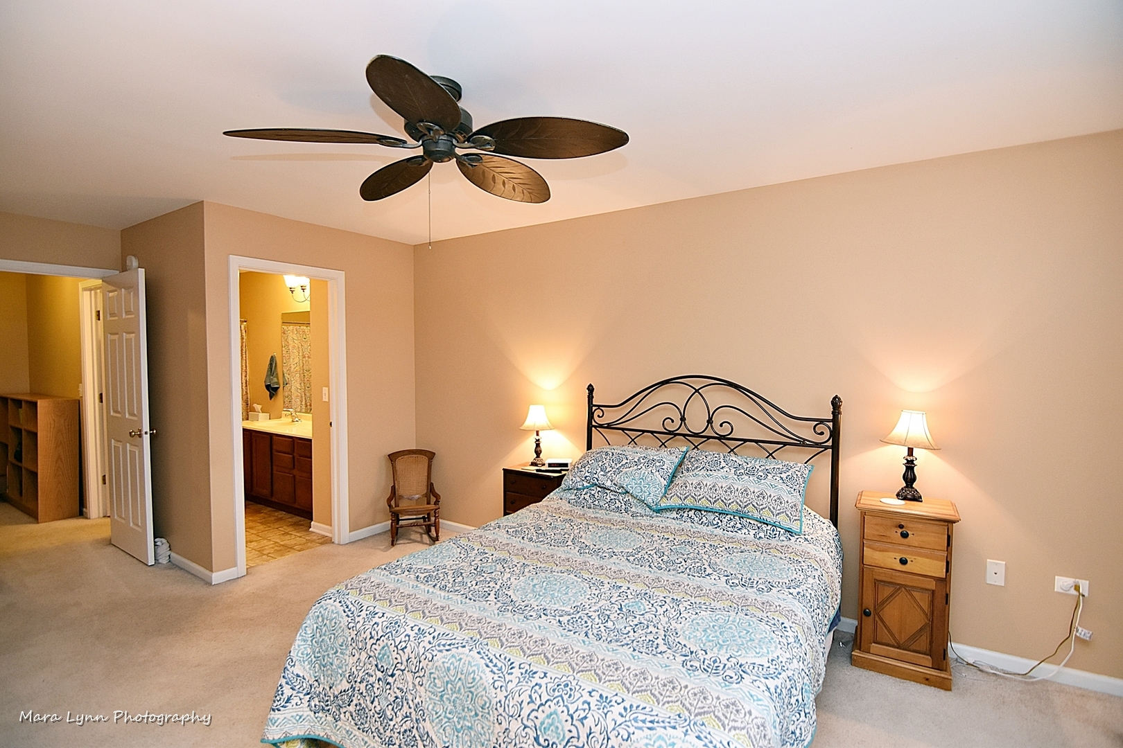 47 Rolling Oaks Road, Unit B Sugar Grove, IL 60554 - Photo 16 of 22 a bedroom with a bed and a chandelier