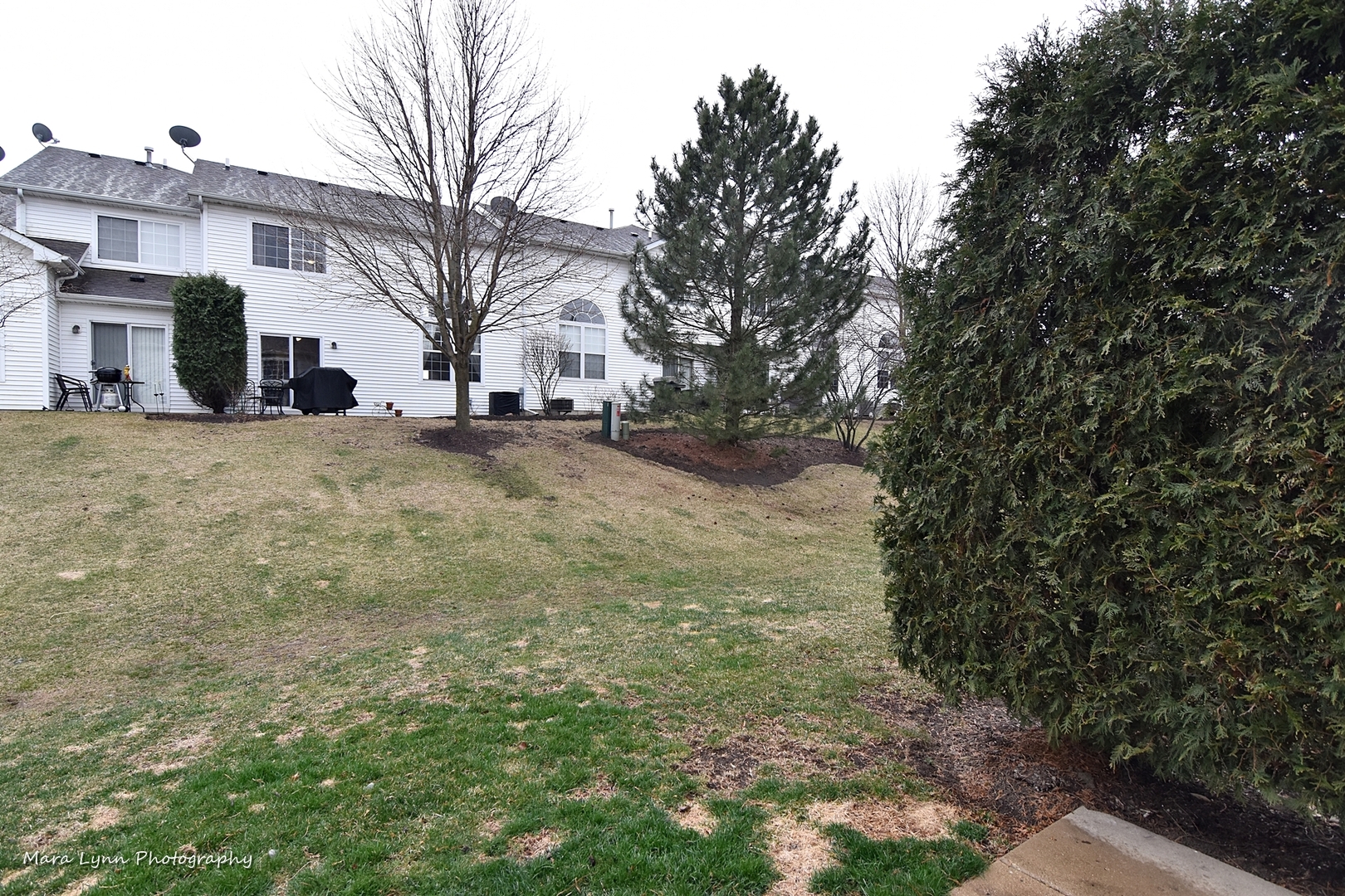 47 Rolling Oaks Road, Unit B Sugar Grove, IL 60554 - Photo 22 of 22 a view of a house with a yard