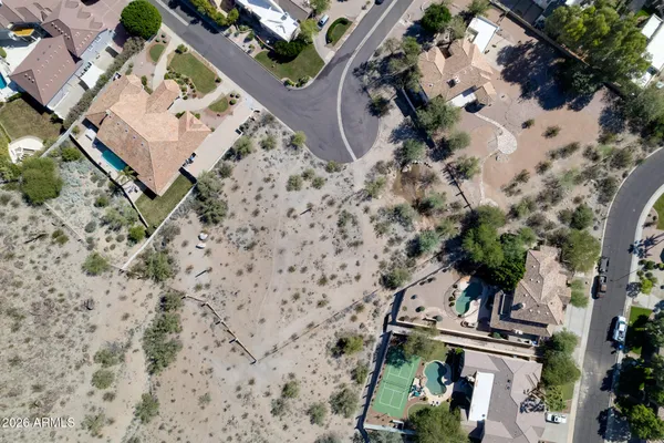 an aerial view of a house with mountain view