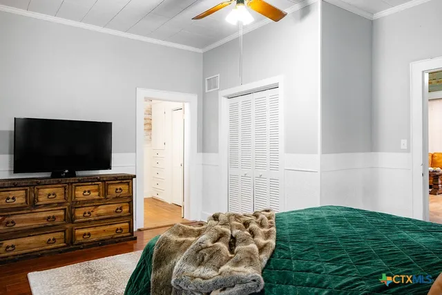 a bathroom with a sink toilet a mirror and shower
