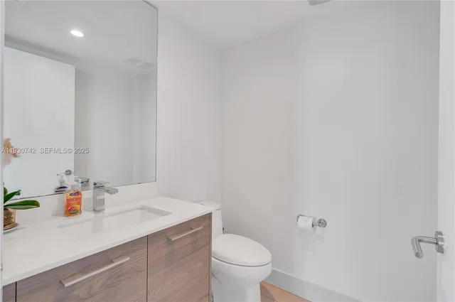 a bathroom with a sink and a toilet