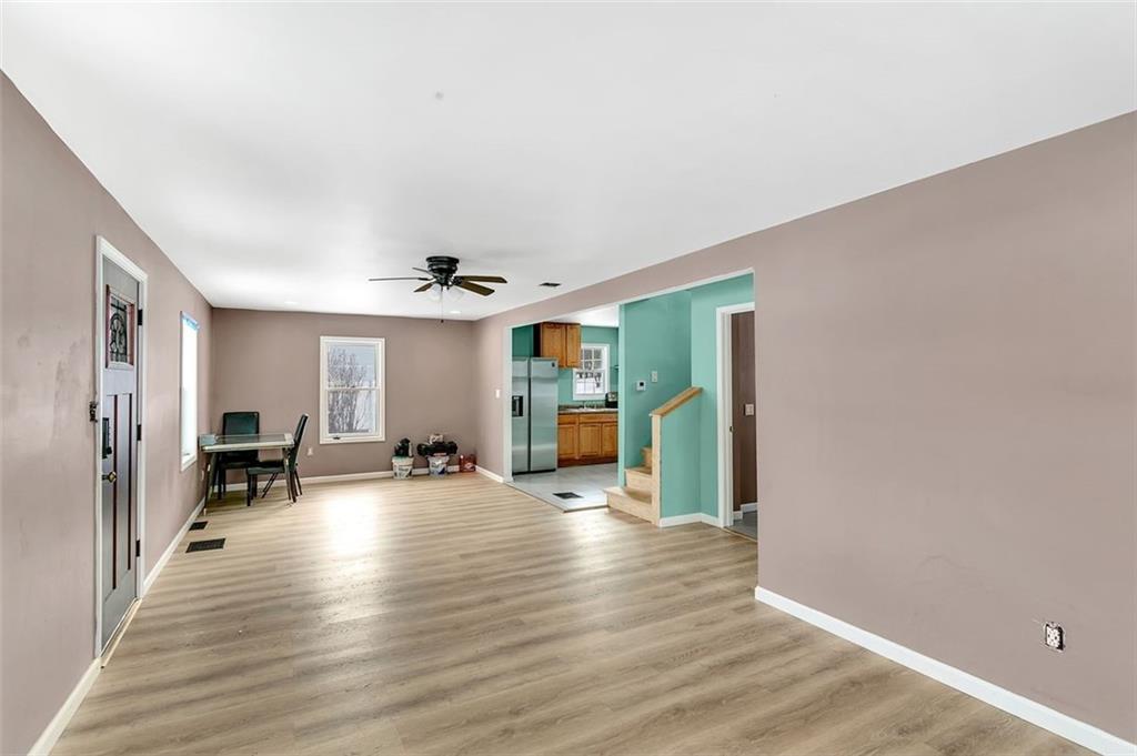 742 Jackson Road Apollo, PA 15613 - Photo 11 of 20 an empty room with wooden floor and windows