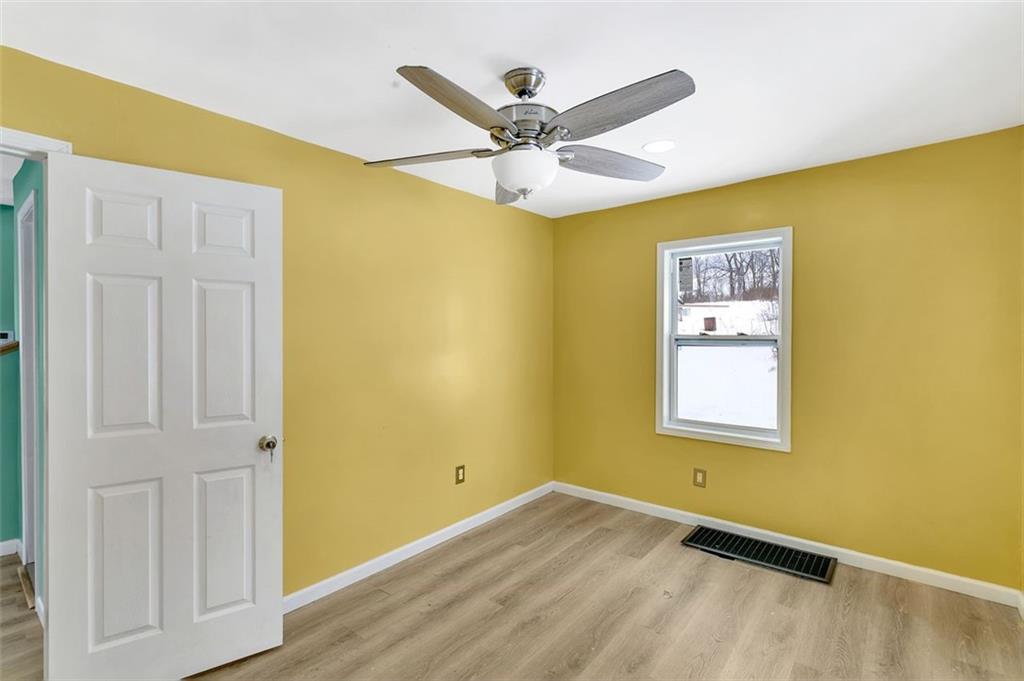 742 Jackson Road Apollo, PA 15613 - Photo 19 of 20 a view of a room with a window and ceiling fan
