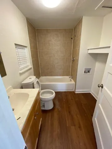 a bathroom with a sink and a toilet