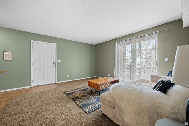 2095 South Main Street, Unit 13 Bountiful, UT 84010 - Photo 11 of 45 Bedroom with carpet flooring and tile patterned flooring