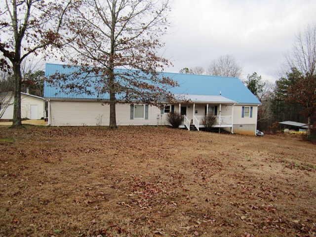 180 Washboard Road Bowdon, GA 30108 - Photo 1 of 1 a front view of a house with a yard