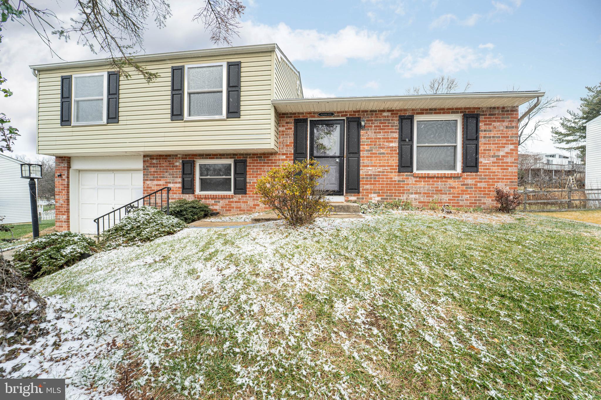 a front view of house with yard
