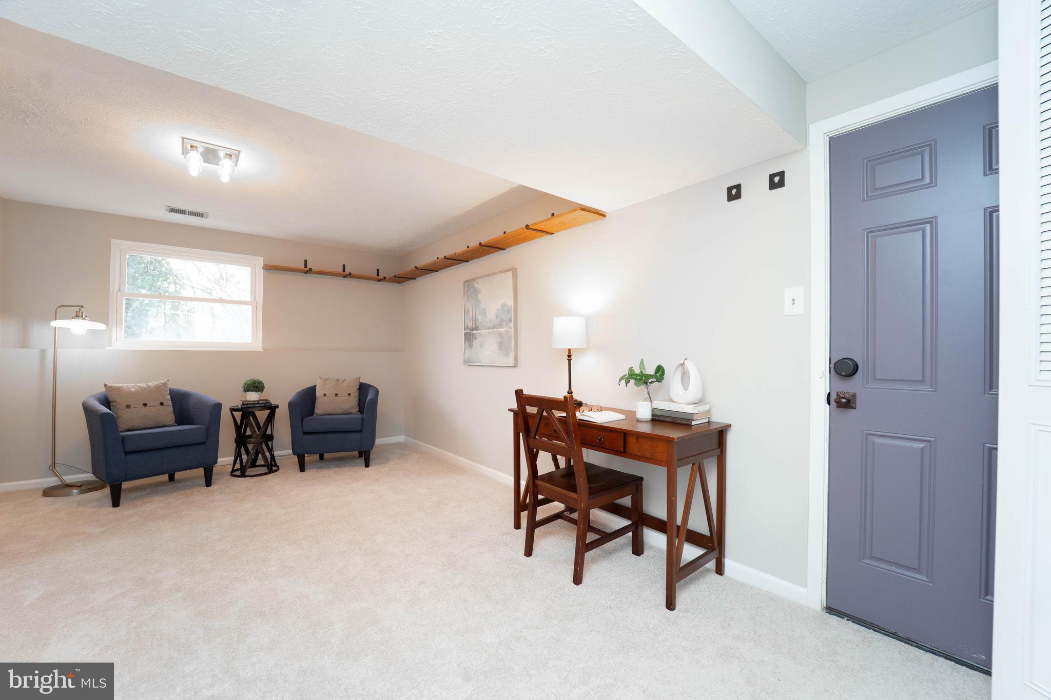 6922 Pinecrest Road Catonsville, MD 21228 - Photo 16 of 36 a workspace with furniture and a window