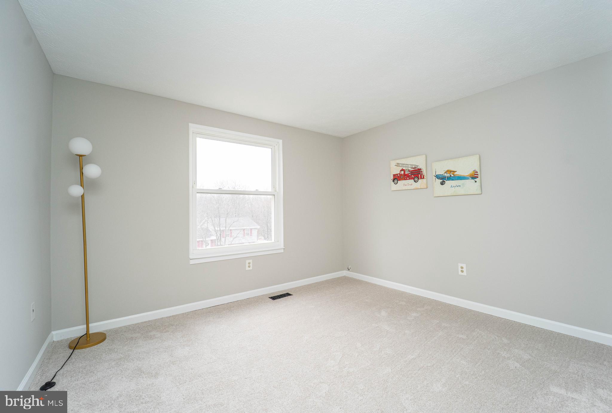 6922 Pinecrest Road Catonsville, MD 21228 - Photo 24 of 36 an empty room with a window