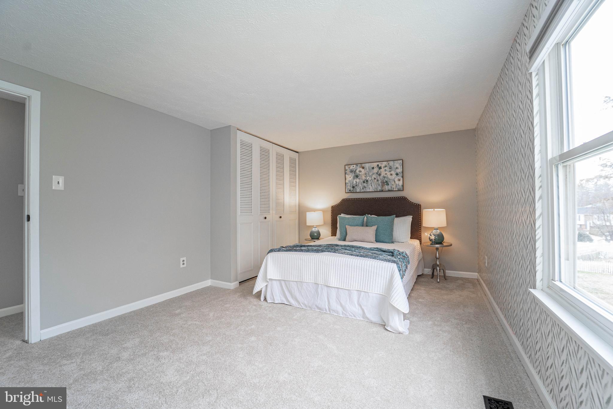 6922 Pinecrest Road Catonsville, MD 21228 - Photo 27 of 36 a bed room with a bed and a large window