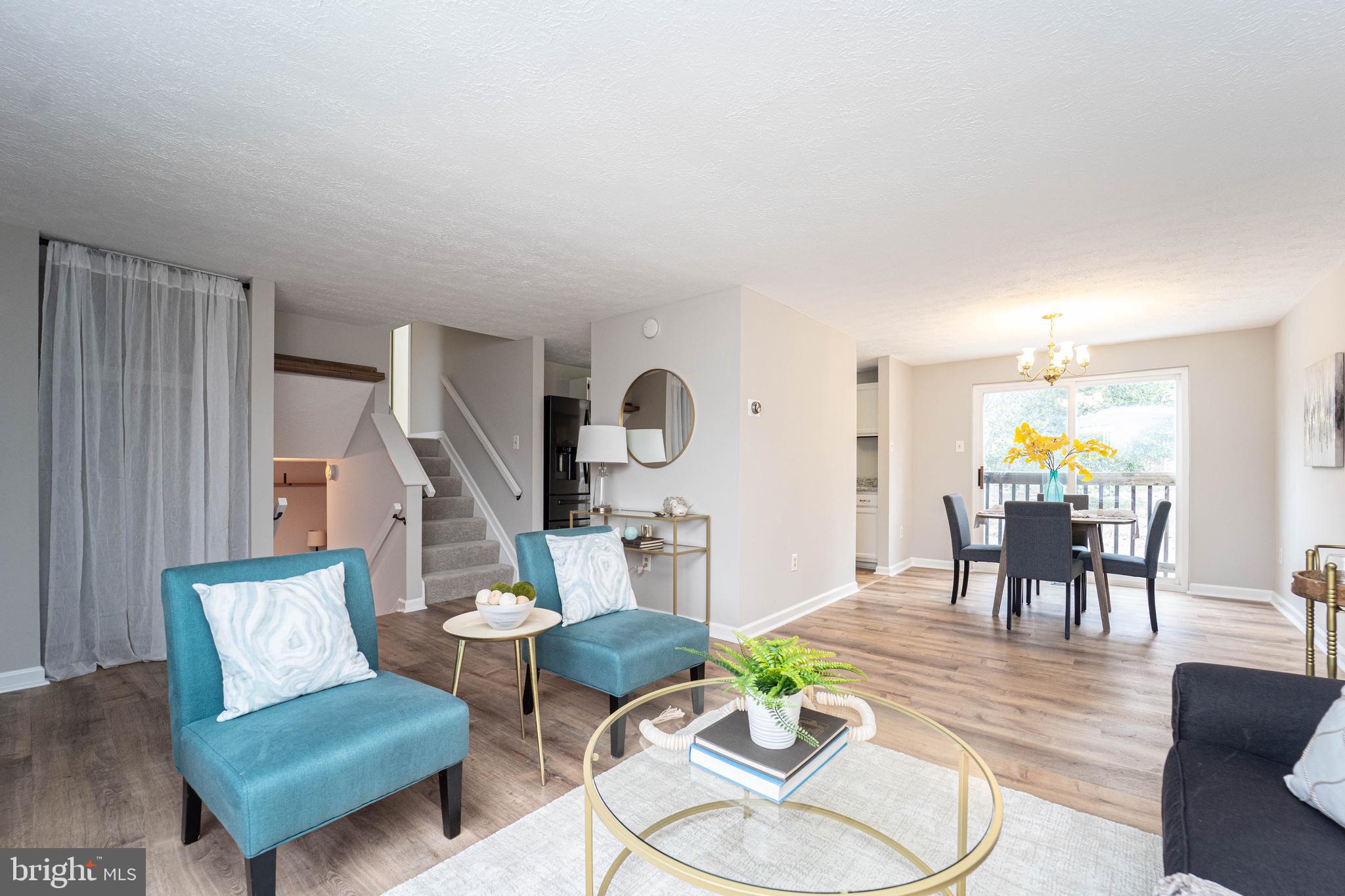 6922 Pinecrest Road Catonsville, MD 21228 - Photo 3 of 36 a living room with furniture and wooden floor