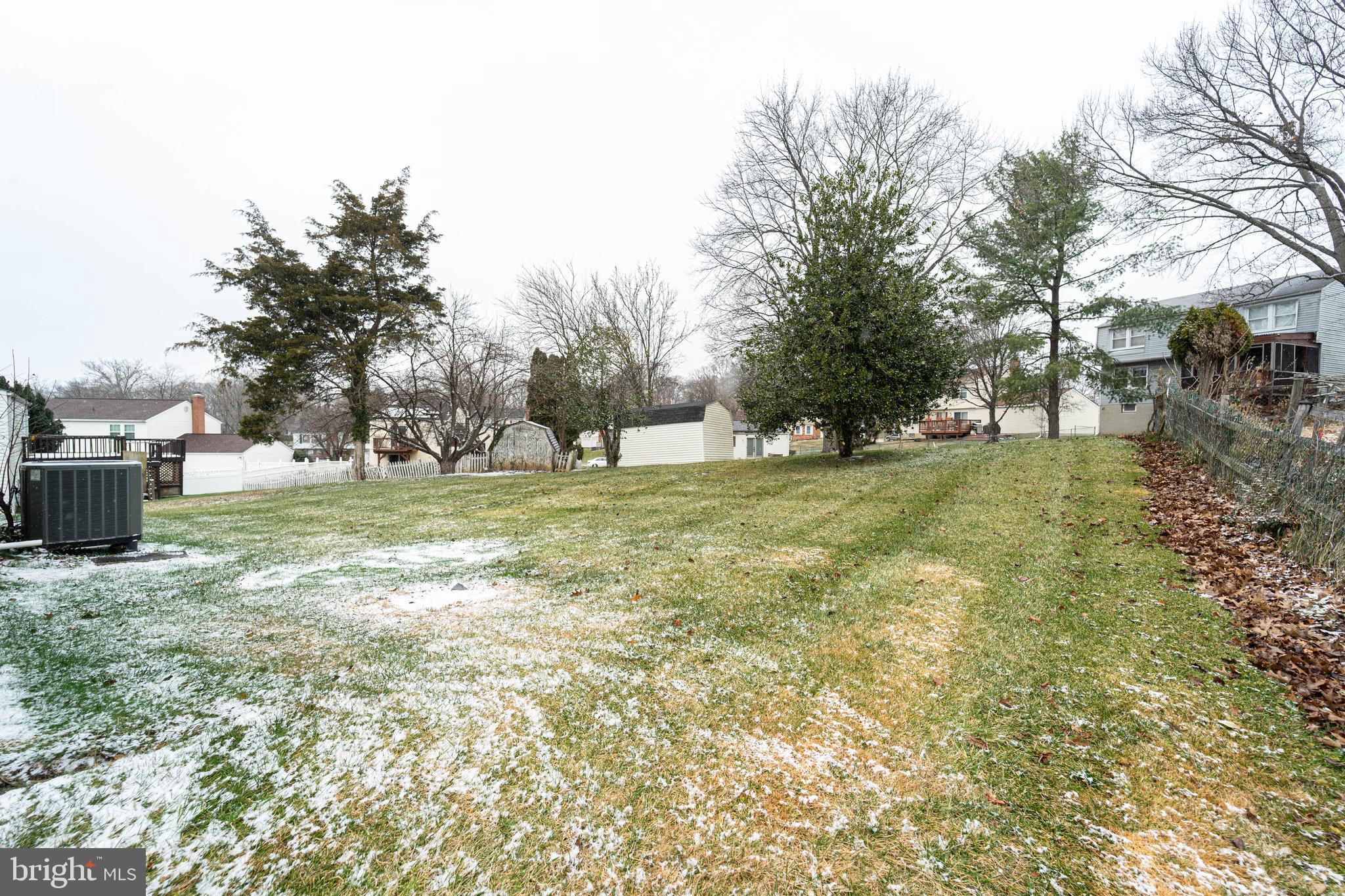 6922 Pinecrest Road Catonsville, MD 21228 - Photo 32 of 36 a view of a ground with large trees