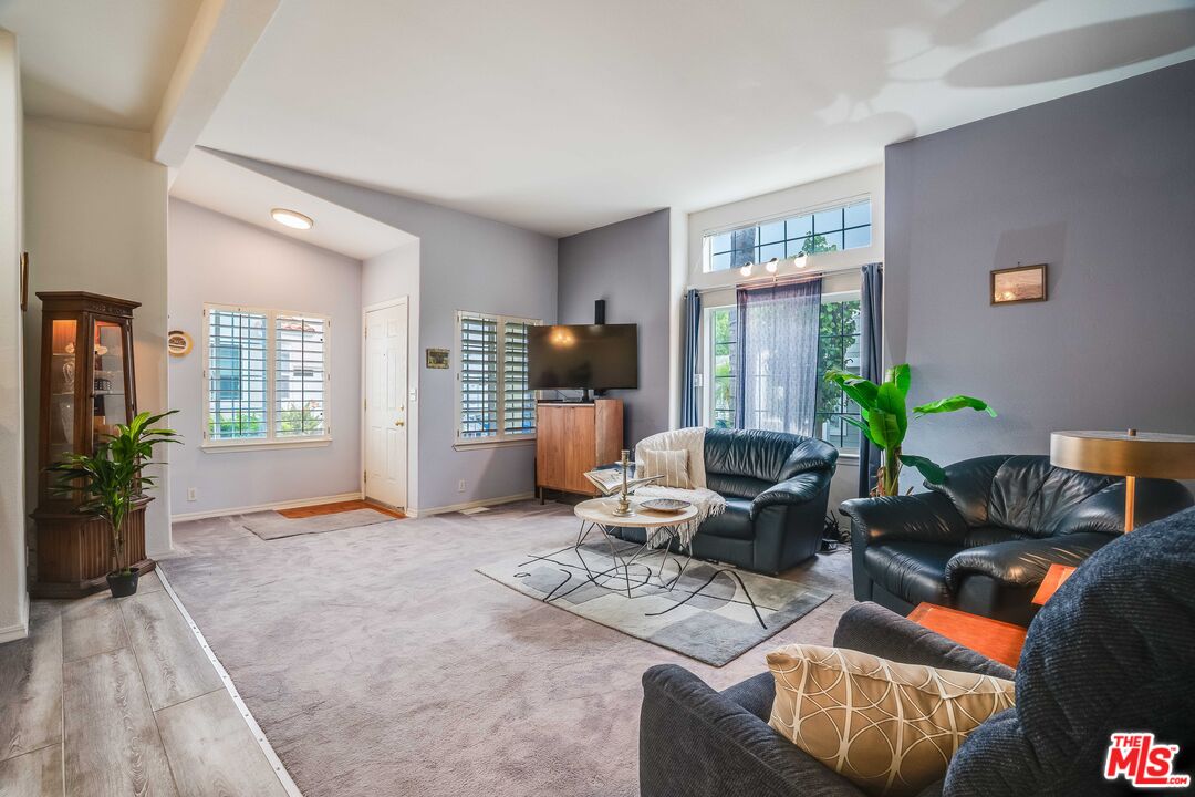 146 Apache Topanga, CA 90290 - Photo 1 of 21 a living room with furniture and a flat screen tv