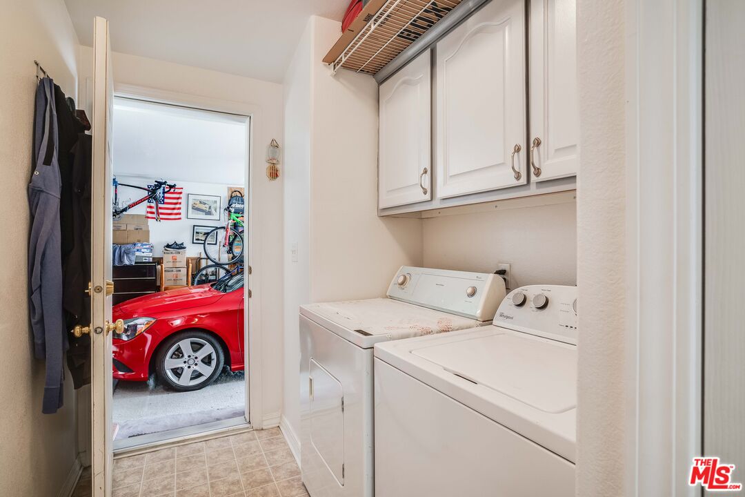 146 Apache Topanga, CA 90290 - Photo 15 of 21 a utility room with dryer and washer