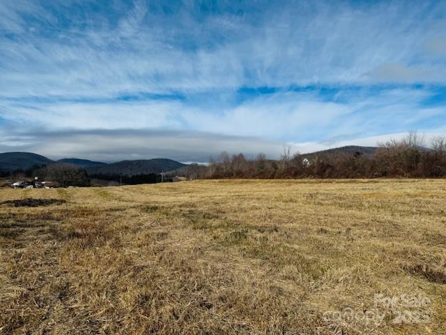 511 Laughter Road Hendersonville, NC 28792 - Photo 2 of 19 a view of lake and mountain