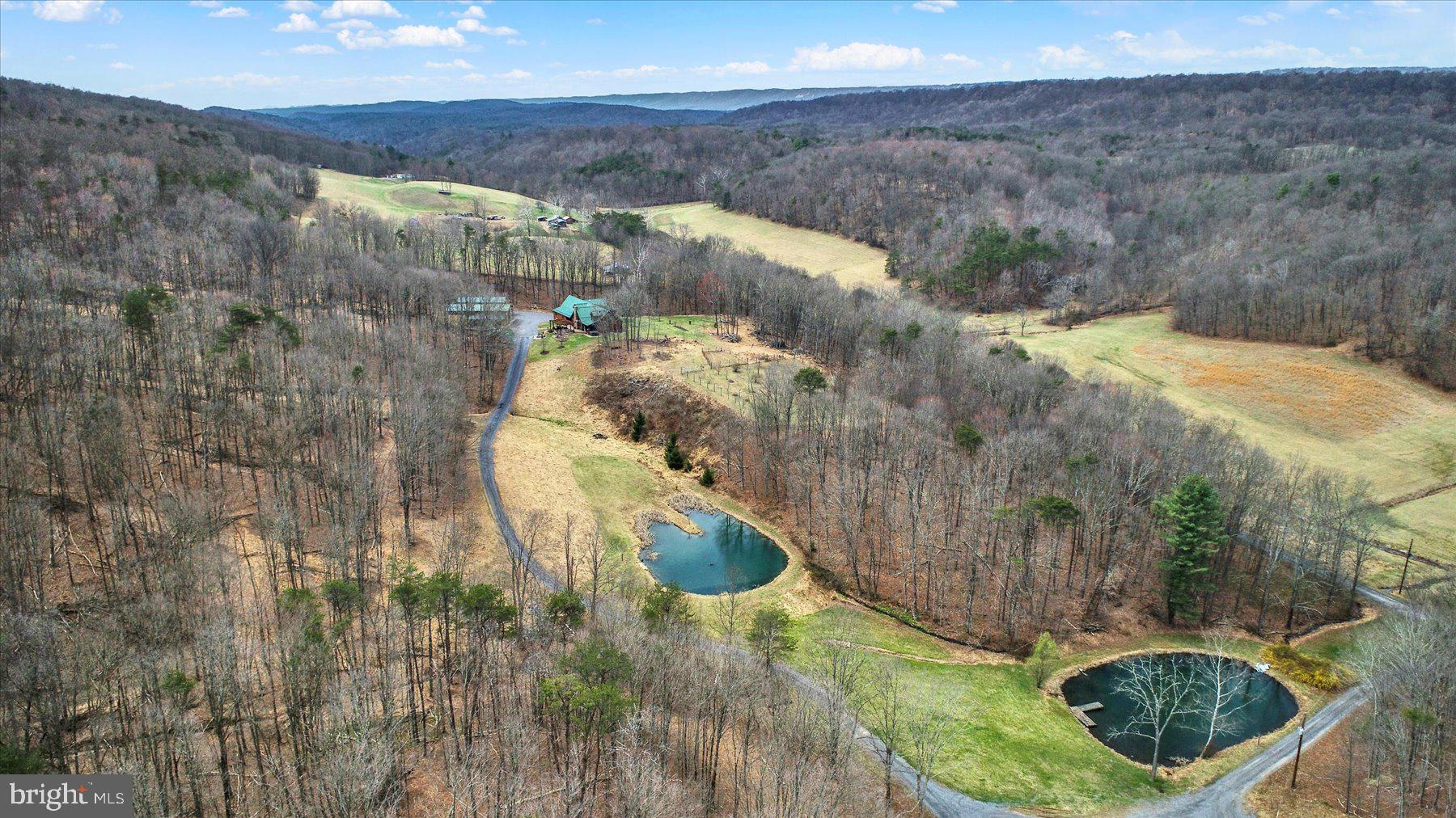 1560 Rhine Hollow Road East Waterford, PA 17021 - Photo 101 of 113 Serene countryside with tranquil ponds.