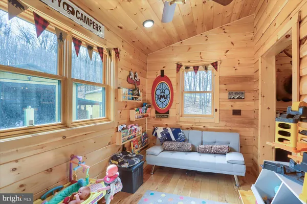 a dining room with furniture and window