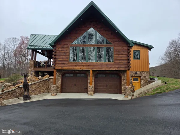 a view of a yard with a mountain