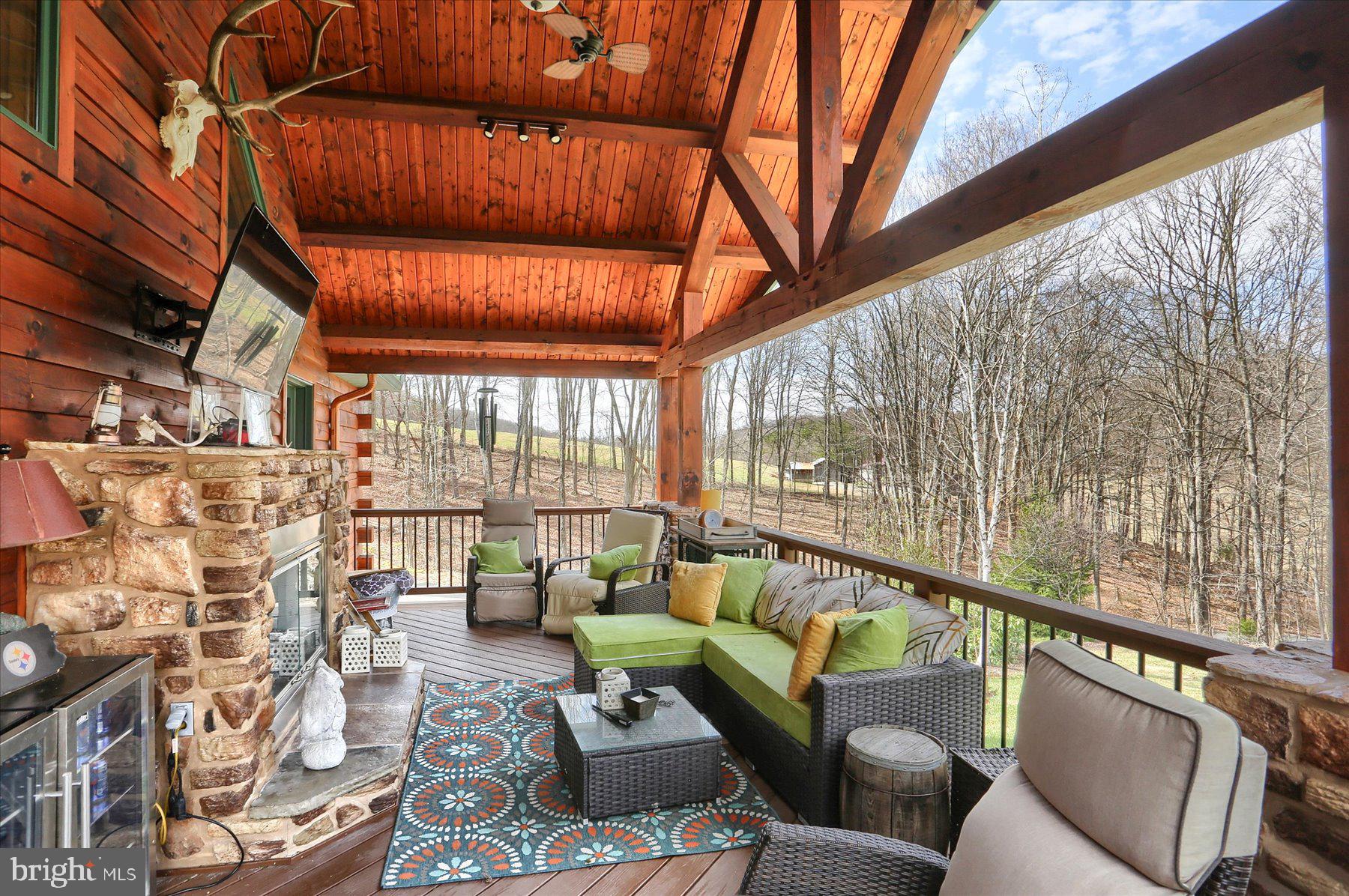 1560 Rhine Hollow Road East Waterford, PA 17021 - Photo 56 of 113 Rear Porch/Deck w/PP Fireplace View 1
