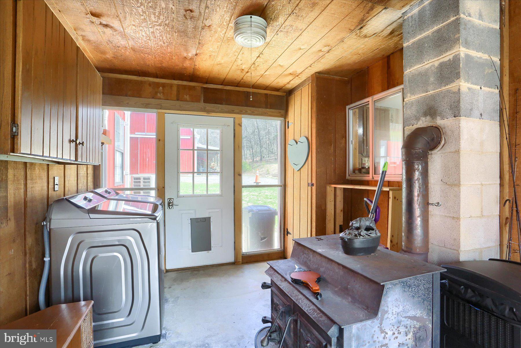1560 Rhine Hollow Road East Waterford, PA 17021 - Photo 81 of 113 RH Mud/Laundry Room With Woodstove