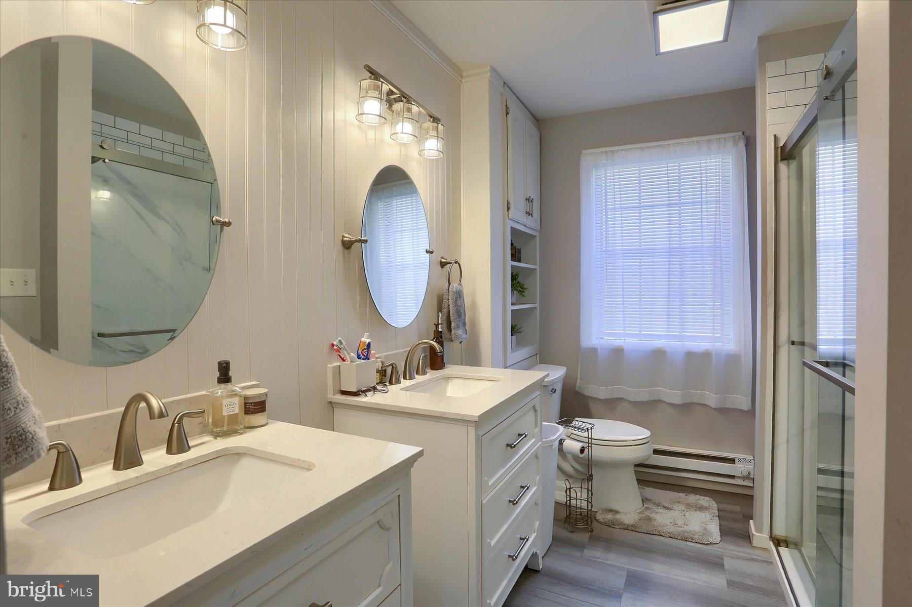 1560 Rhine Hollow Road East Waterford, PA 17021 - Photo 85 of 113 a bathroom with a granite countertop sink mirror vanity and toilet