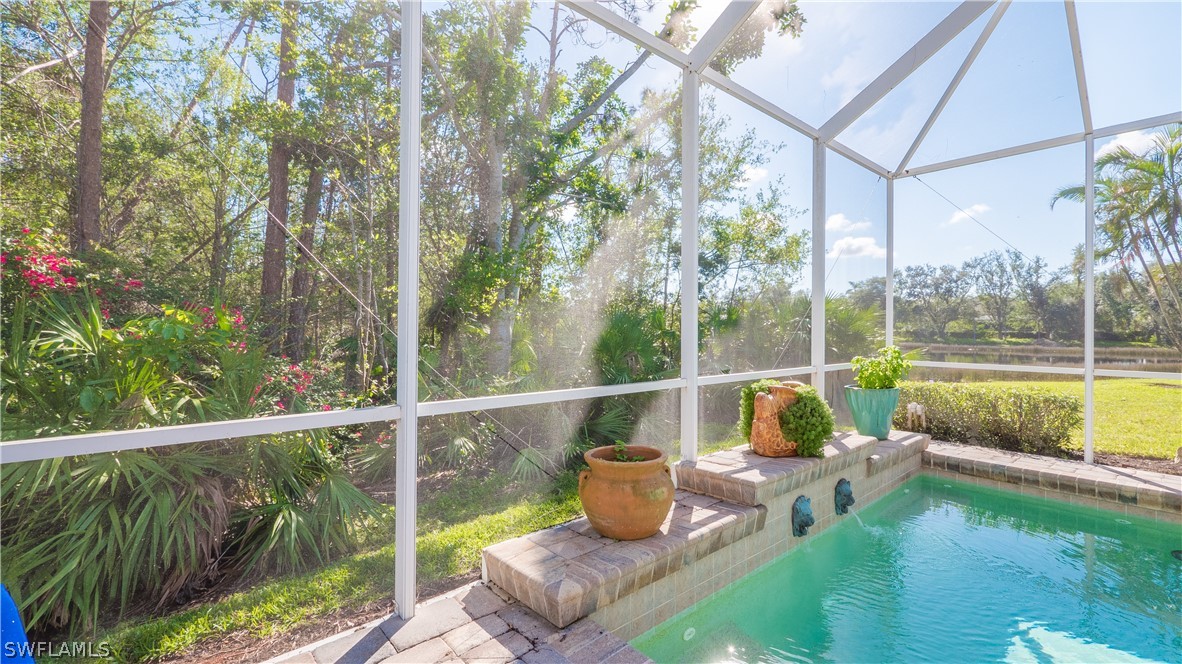 a view of a balcony with chair and table