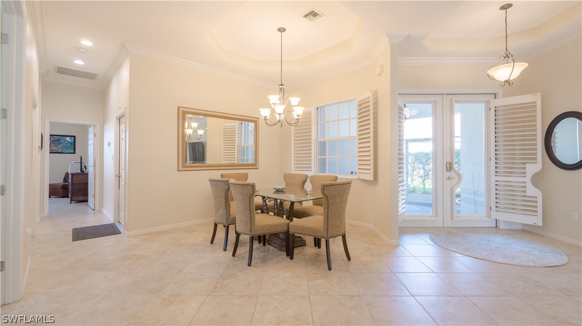 8734 Brittania Drive Fort Myers, FL 33912 - Photo 17 of 34 a dining room with furniture and window