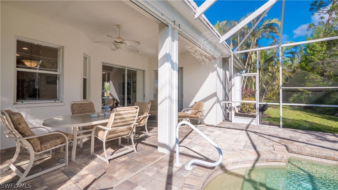 8734 Brittania Drive Fort Myers, FL 33912 - Photo 25 of 34 a view of an chairs and tables in patio