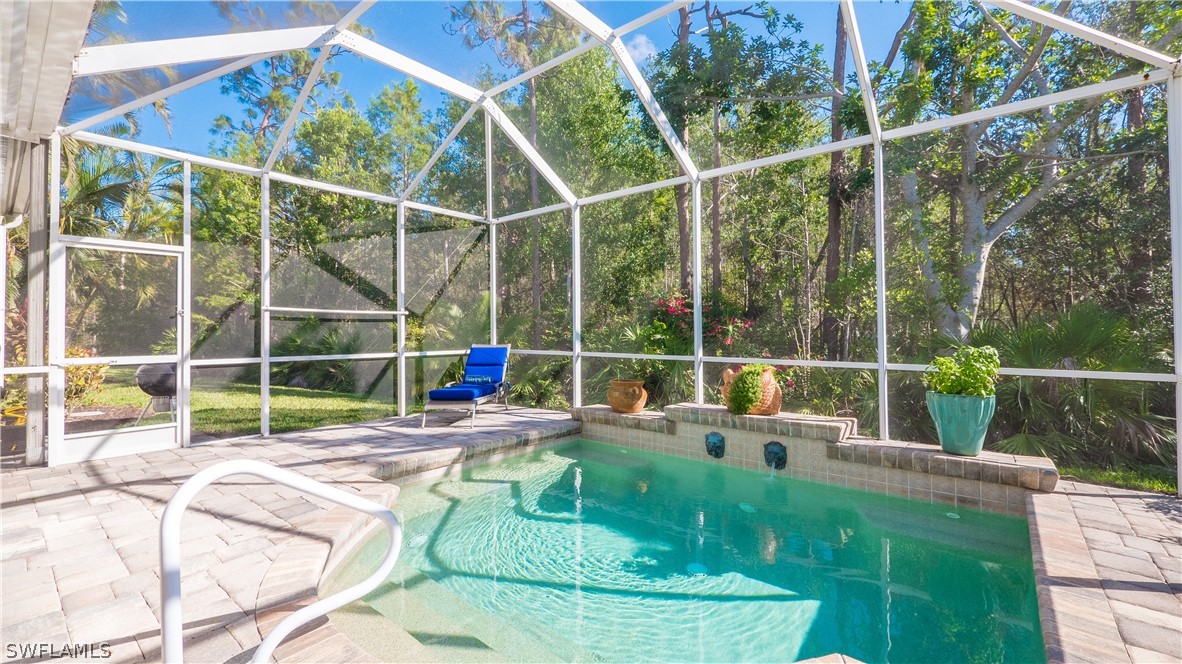 8734 Brittania Drive Fort Myers, FL 33912 - Photo 26 of 34 a view of a backyard with sitting area