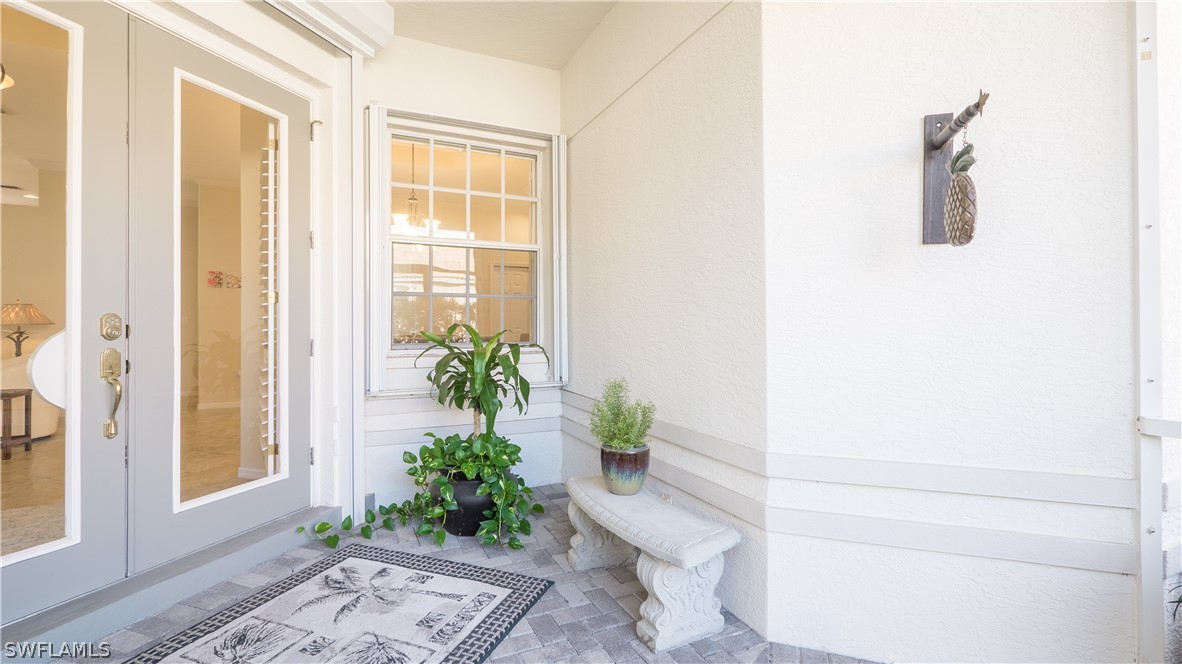 8734 Brittania Drive Fort Myers, FL 33912 - Photo 3 of 34 a bathroom with a potted plant