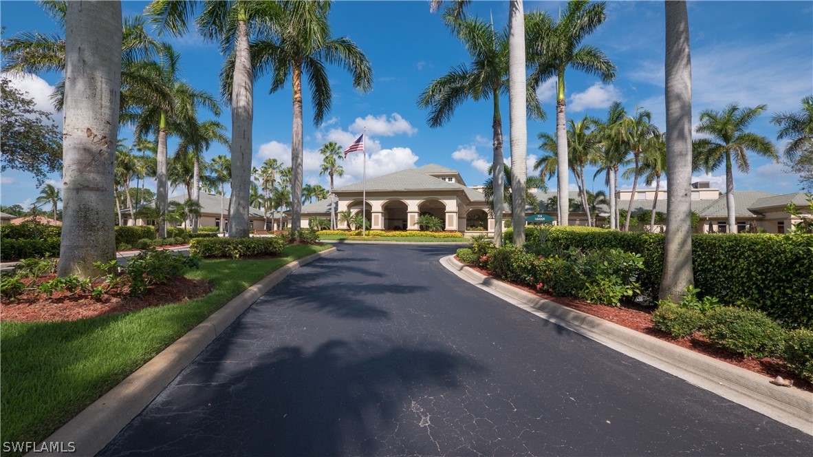 8734 Brittania Drive Fort Myers, FL 33912 - Photo 33 of 34 a view of a street with palm trees