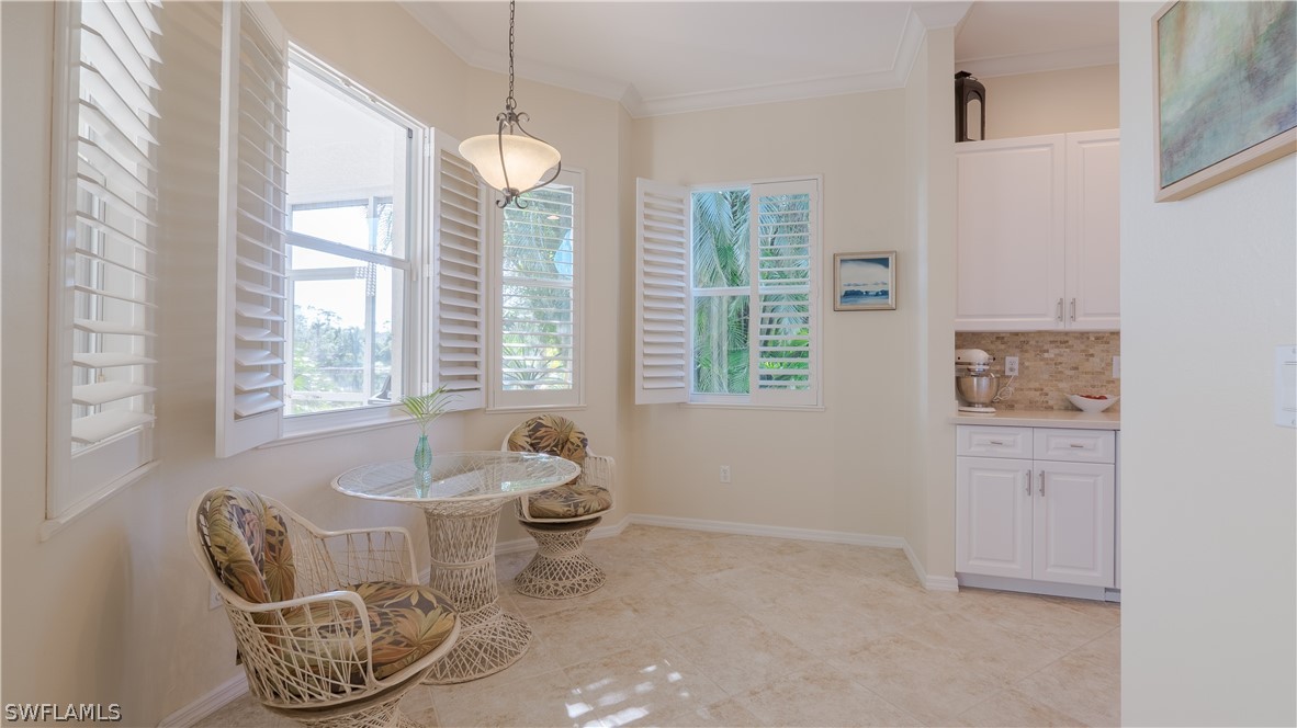8734 Brittania Drive Fort Myers, FL 33912 - Photo 9 of 34 a living room with furniture and a window