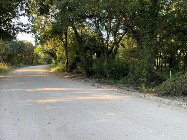 a view of a backyard of a house