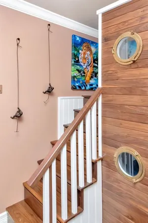 a kitchen with stainless steel appliances granite countertop a stove and a microwave