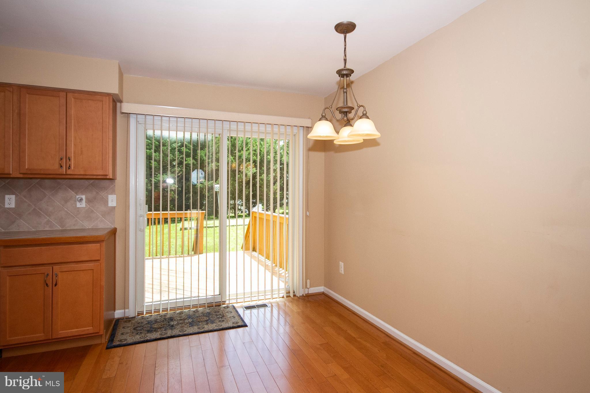 317 Pylesville Road Pylesville, MD 21132 - Photo 8 of 27 Dining Area with sliders to deck