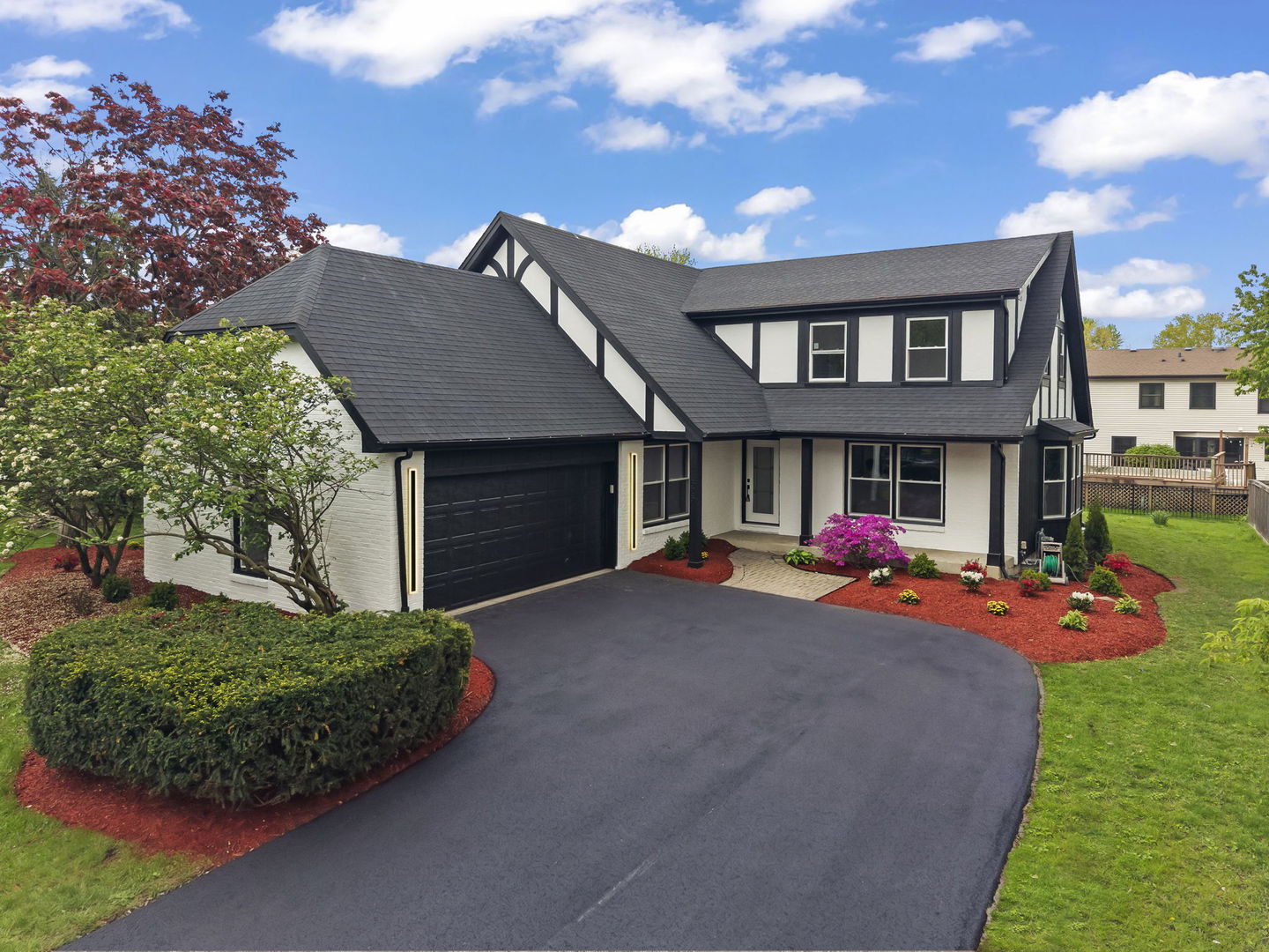 625 Edward Road Naperville, IL 60540 - Photo 1 of 47 a front view of a house with a yard and garage