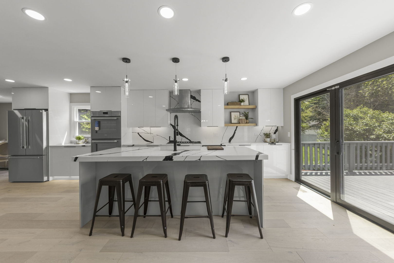 625 Edward Road Naperville, IL 60540 - Photo 11 of 47 a dining hall with stainless steel appliances granite countertop a table chairs sink and cabinets