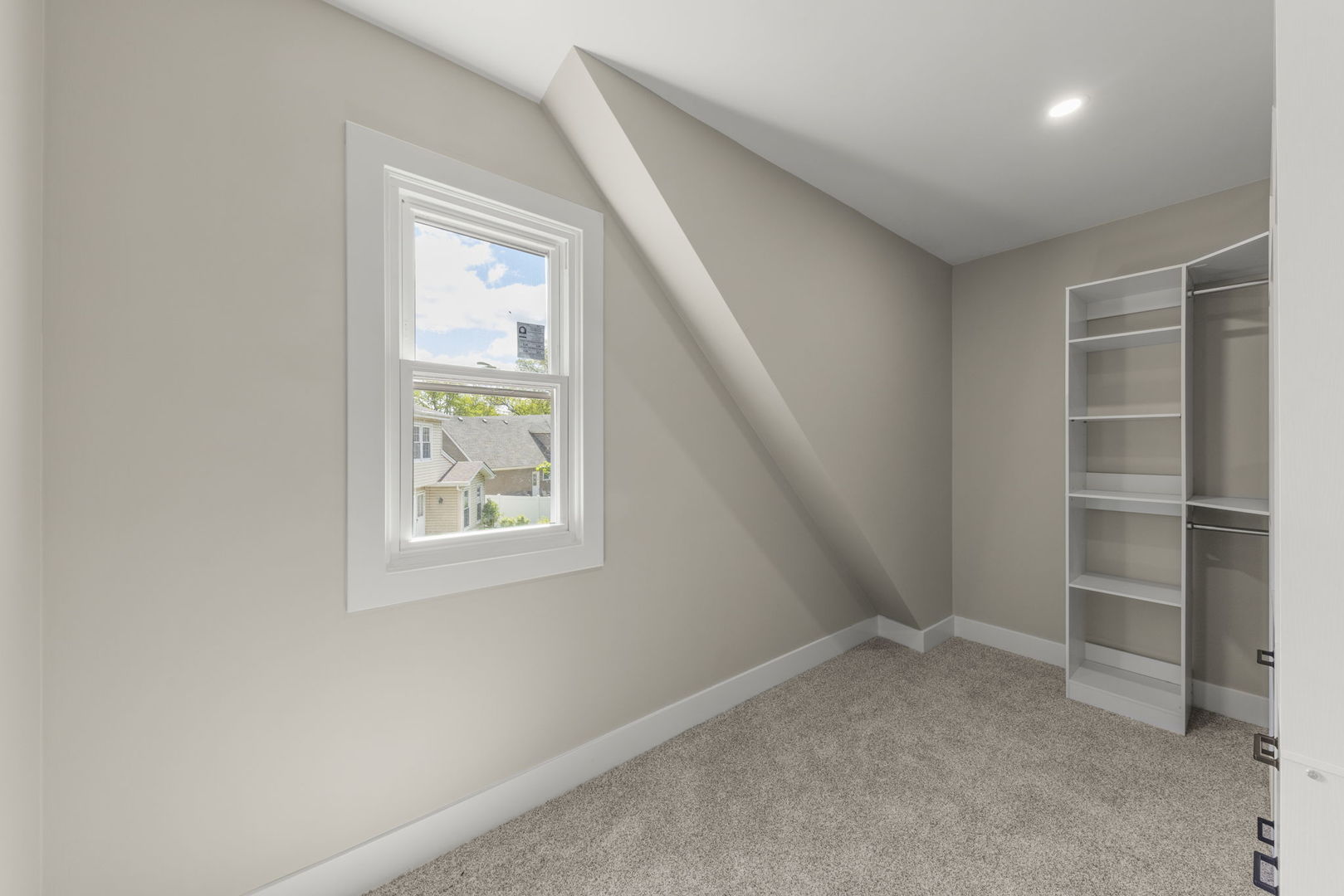 625 Edward Road Naperville, IL 60540 - Photo 25 of 47 an empty room with a window