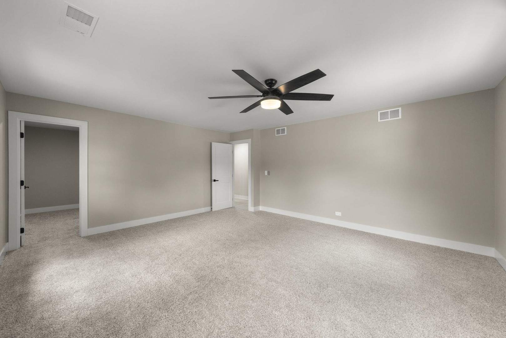 625 Edward Road Naperville, IL 60540 - Photo 30 of 47 an empty room with a ceiling fan and a window