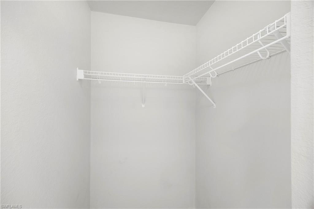 8550 Kingbird Loop, Unit 615 Estero, FL 33967 - Photo 11 of 35 a view of a room with racks on the wall