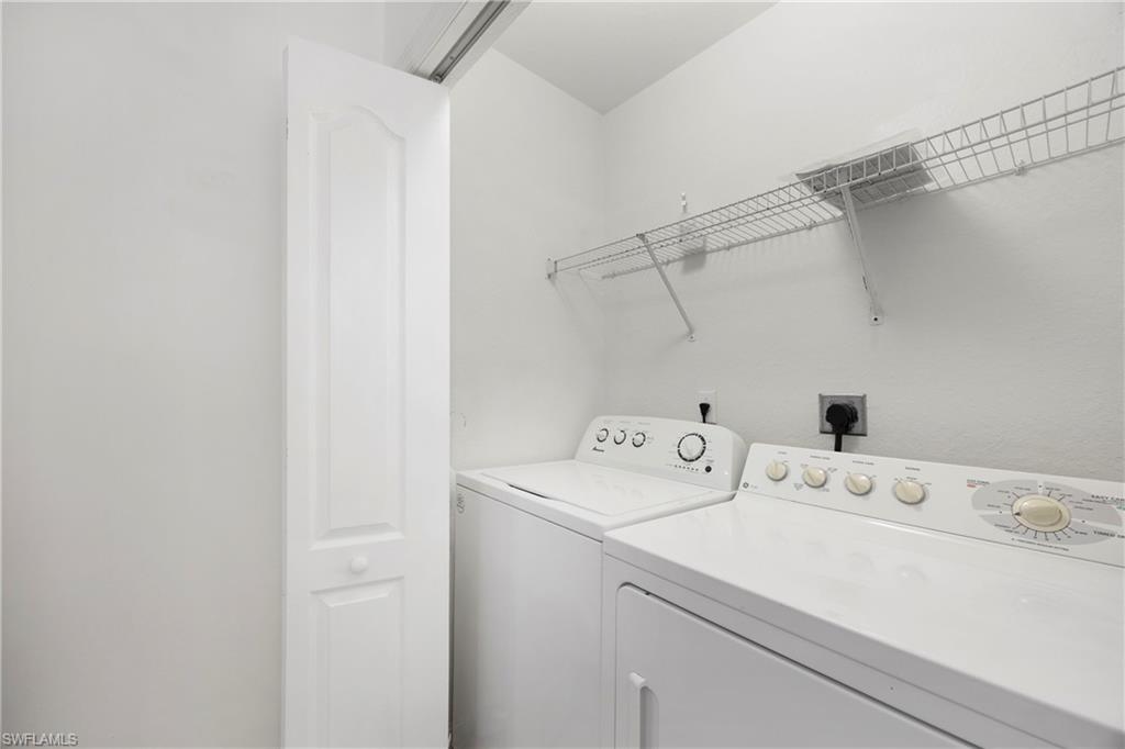 8550 Kingbird Loop, Unit 615 Estero, FL 33967 - Photo 13 of 35 a utility room with dryer and washer