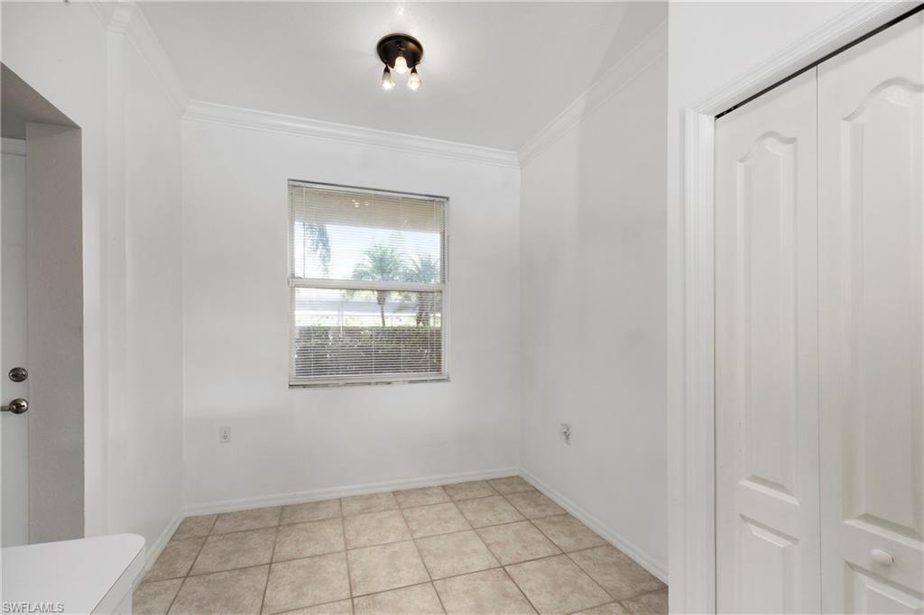 8550 Kingbird Loop, Unit 615 Estero, FL 33967 - Photo 25 of 35 a view of an empty room with a window