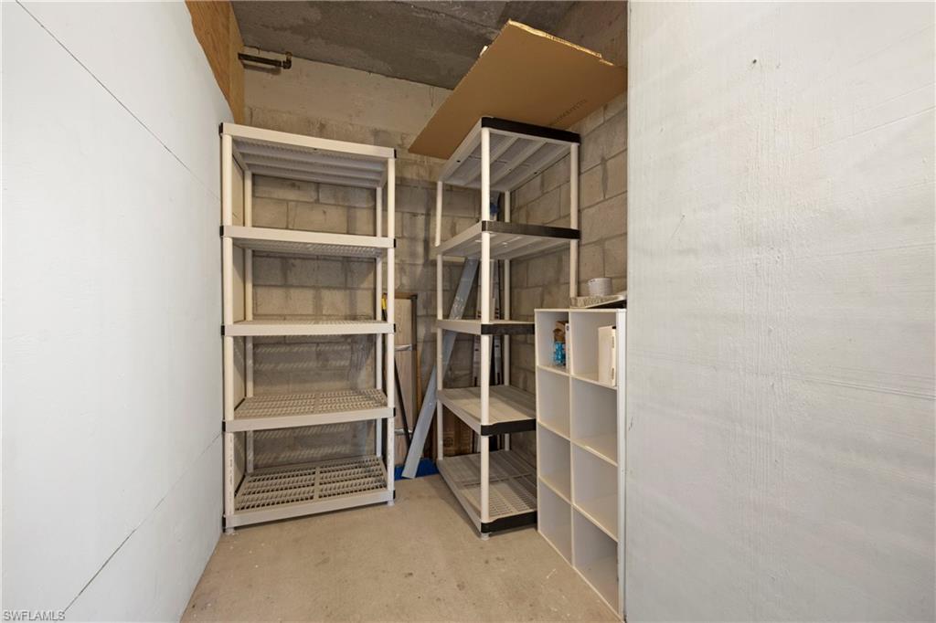 8550 Kingbird Loop, Unit 615 Estero, FL 33967 - Photo 27 of 35 a room with walk in closet and empty shelves