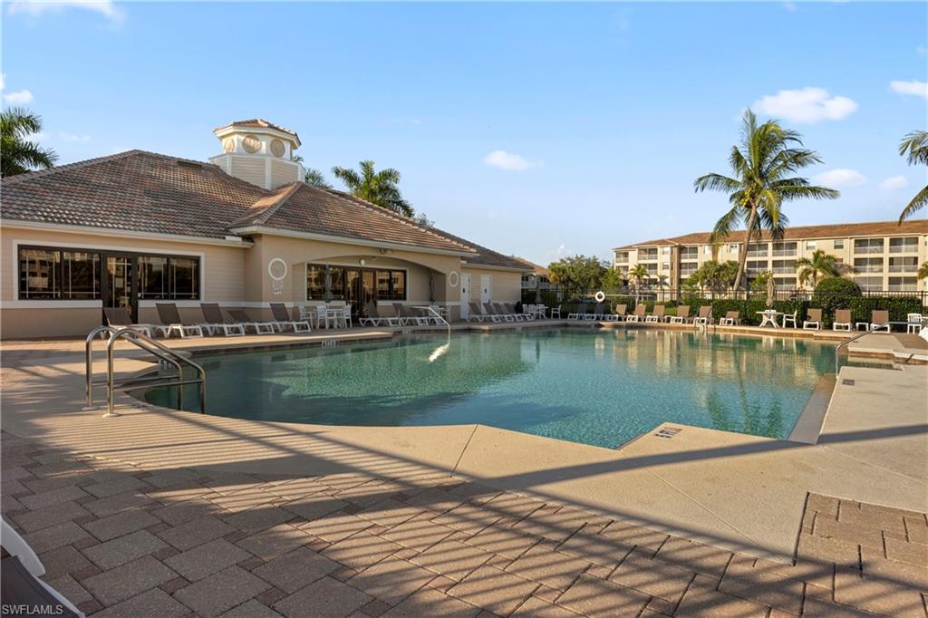 8550 Kingbird Loop, Unit 615 Estero, FL 33967 - Photo 31 of 35 a front view of a house with lake view