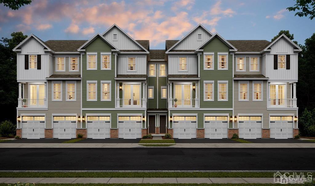 728 Station Road, Unit 524 Dunellen, NJ 08812 - Photo 4 of 11 a front view of residential houses with street