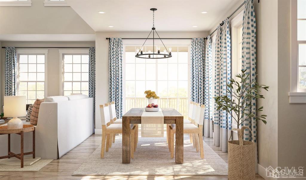 728 Station Road, Unit 524 Dunellen, NJ 08812 - Photo 6 of 11 a dining room with furniture window and wooden floor